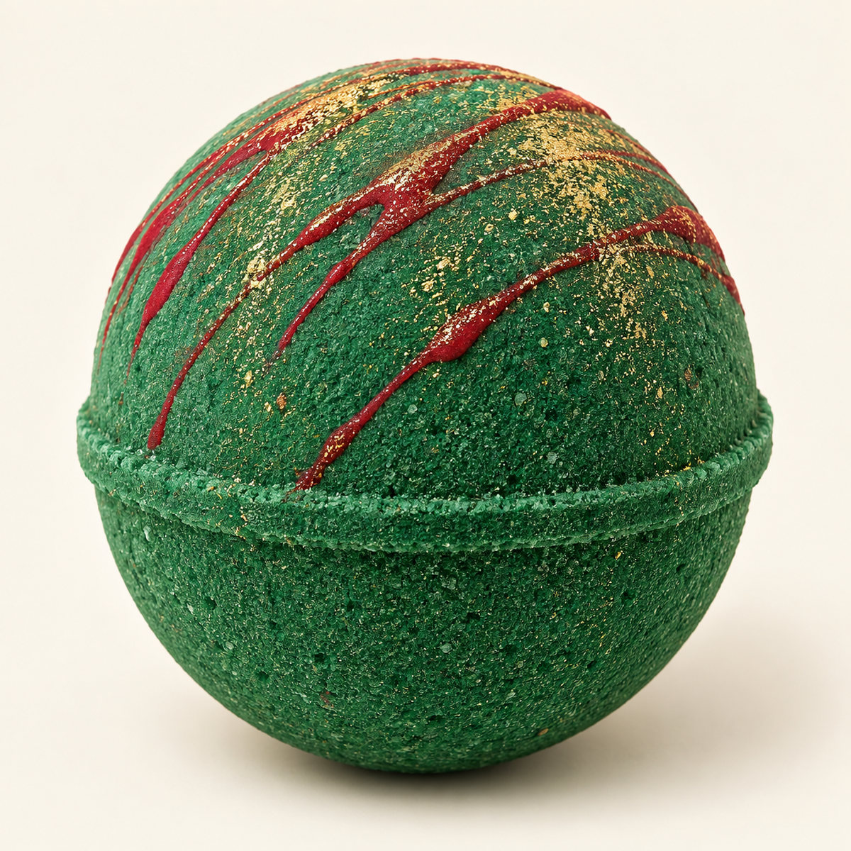 Patchouli & Tonka Bean design illustration: emerald green bath bomb with red drizzle and gold dust